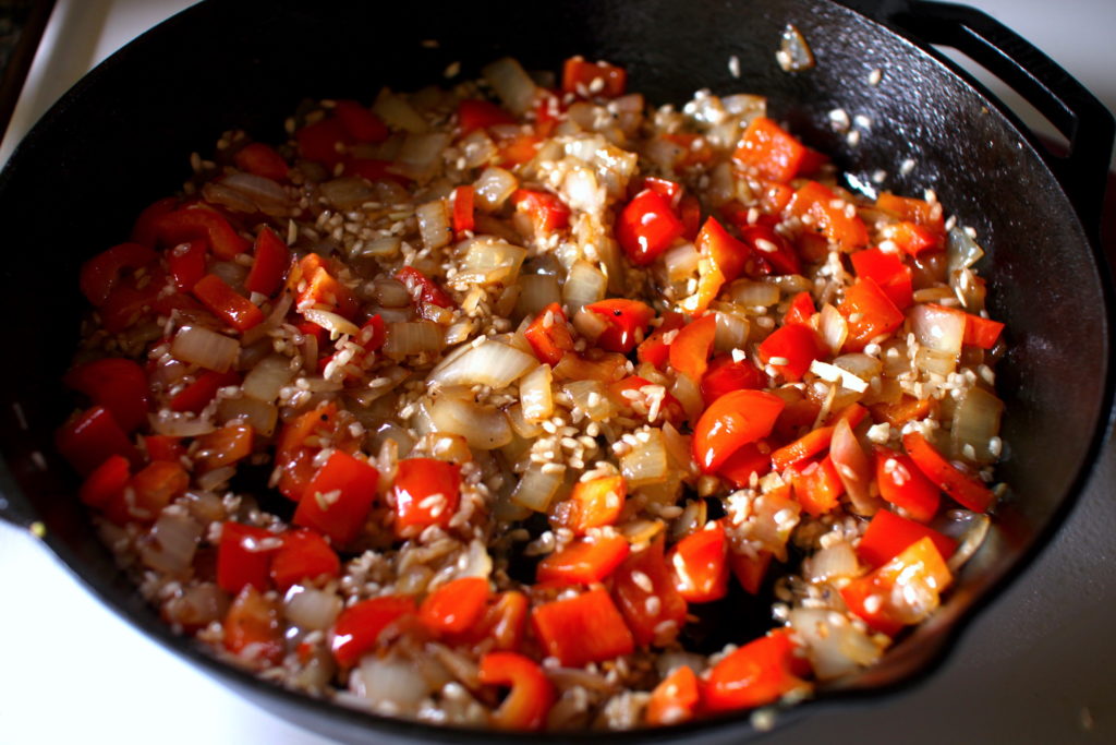 Red bell peppers, onions and rice
