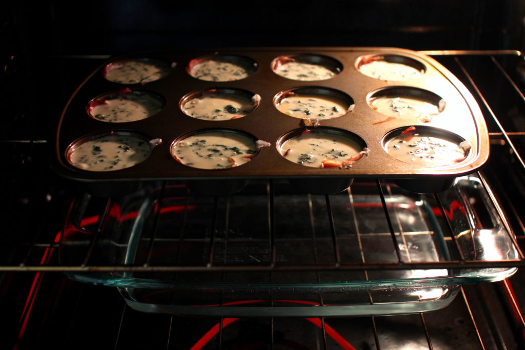 Cheesy Prosciutto Egg Bites in oven