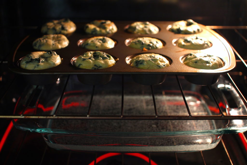 Cheesy Prosciutto Egg Bites in oven