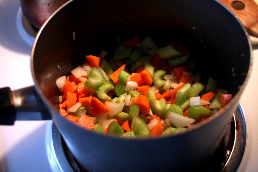 Photo of raw mirepoix in a pot